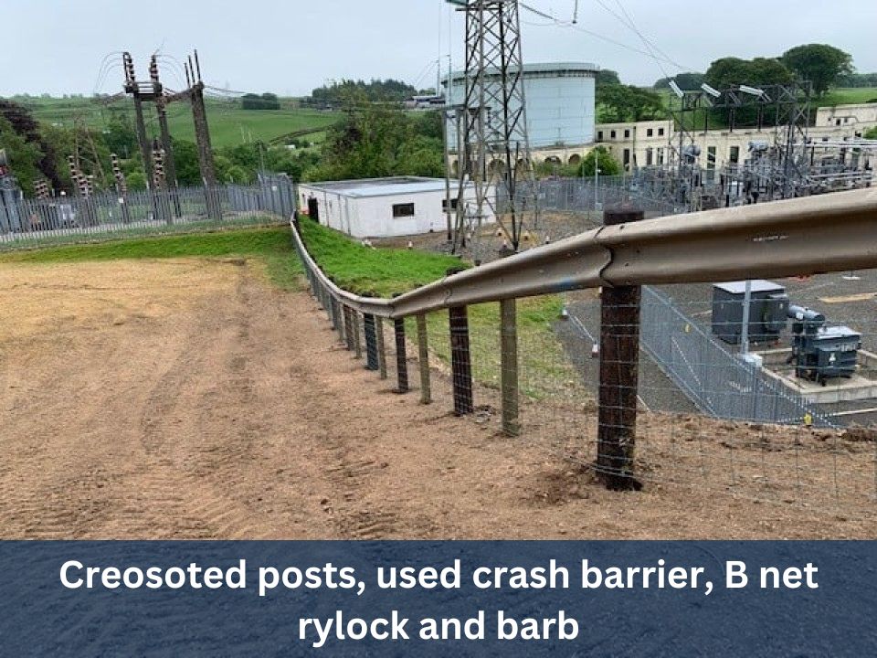 Creosoted posts, used crash barrier, B net rylock and barb