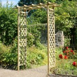 Zest sunset arch is a wooden garden arch perfect for any garden, shown here on a path