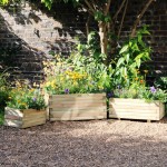 Zest Gresford garden planter box shown here in a set of three, side by side
