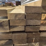 Stack of 4" x 1½" wooden fence rails