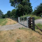 45" 6 bar metal field gate shown in a field