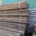 6" x 1" wooden rails in a pile
