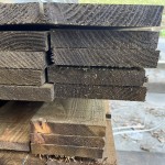 Stack of 6" x 1" wooden fencing rails