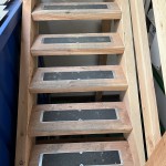 Anti-Slip plates shown being used on a stairs