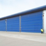 Galebreaker maxidoor shown fully closed on front of a warehouse