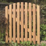 Charltons curved wicket gate which is lightweight and framed, ledged and braced with a planed finish in a garden setting