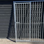 This dog pen front panel and gate has 75mm spacings between bars, Shown here with a close up of the gate in the panels