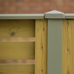 DuraPost capping rail shown on top of a wooden fence
