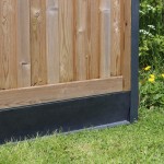 A DuraPost Anthracite Grey Z board shown on the bottom of a fence