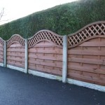 This San Remo Omega fence panel comes with trellis on top and is our most popular fence panels, shown here in a garden.