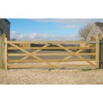 Charltons Forester wooden gate with 5 bars hung across a driveway entrance with metal hinges and latching bolt