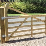 Wooden gate hinge kit attached to gate