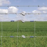 Gripple twisters shown on a fence