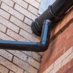 Downpipe bend 112½° for 170mm plastic guttering shown here on a building