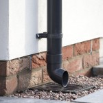 Shoe for 170mm deep style plastic guttering, shown here on a building