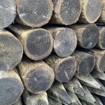 UC4 Kiln Dried homegrown Larch posts shown in a pile