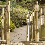 These Scandinavian and Baltic treated redwood turned decking posts are a decorative post.  Shown here in a garden setting.