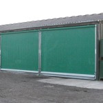Galebreaker Agridoor Classic shown on a shed opening.