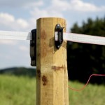Corner post insulator shown on an electric fence