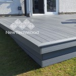 Newtechwood Ultrashield composite decking boards shown in a garden