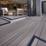 Ultrashield composite wood decking shown next to a house