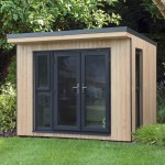 Forest Gardens Xtend 3.0+ insulated outdoor office shown in a garden setting