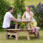 Zest Katie round picnic table being used for outside dining