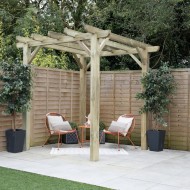 Forest garden pergola shown in the corner of a garden