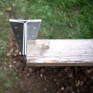 Top view of a DuraPost Sleeper T Post with some garden sleepers attached to it