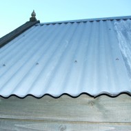 Self-drilling tek screws are designed for fixing metal cladding sheets into timber purlins. Shown here on cladding panels