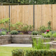 DuraPost cover strips shown on a DuraPost fencing system