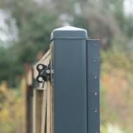 DuraPost U channel shown screwed to the side of a DuraPost gate post