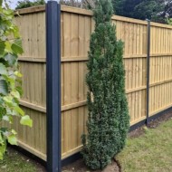 DuraPost u channel shown on both sides of a DuraPost corner post