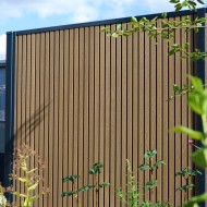 DuraPost Urban composite fence panels shown in a garden