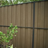 DuraPost natural vento fence boards shown on a fence panel