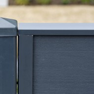 DuraPost post cap and rail shown on a composite fence