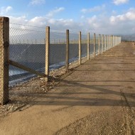 Square posts shown on a fence line
