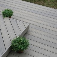 Ultrashield composite decking boards shown in a garden