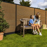 DuraPost Urban Composite Sand fence panels shown with Black urban rails and posts