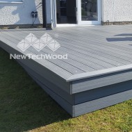 Silver Grey Ultrashield fascia composite boards shown in a garden setting