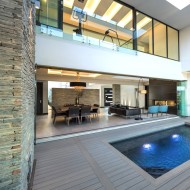 UltraShield decking boards composite shown beside a swimming pool