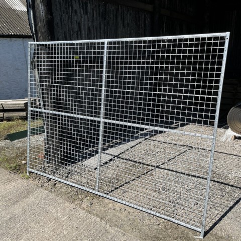 This dog pen side panel is roughly 6ft high by 8ft long.  It is covered in 2″ x 2″ mesh, making it suitable for all dogs. 