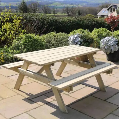 Zest Laura picnic table shown in a garden setting