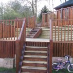 These Scandinavian and Baltic treated redwood decking spindles fit in our decking handrail, shown here around decking